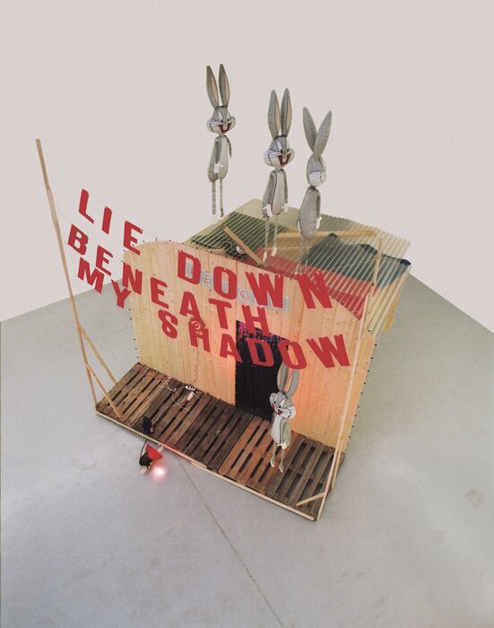 Lie down beneath my shadow