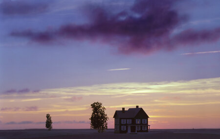 Haus unter roter Wolke